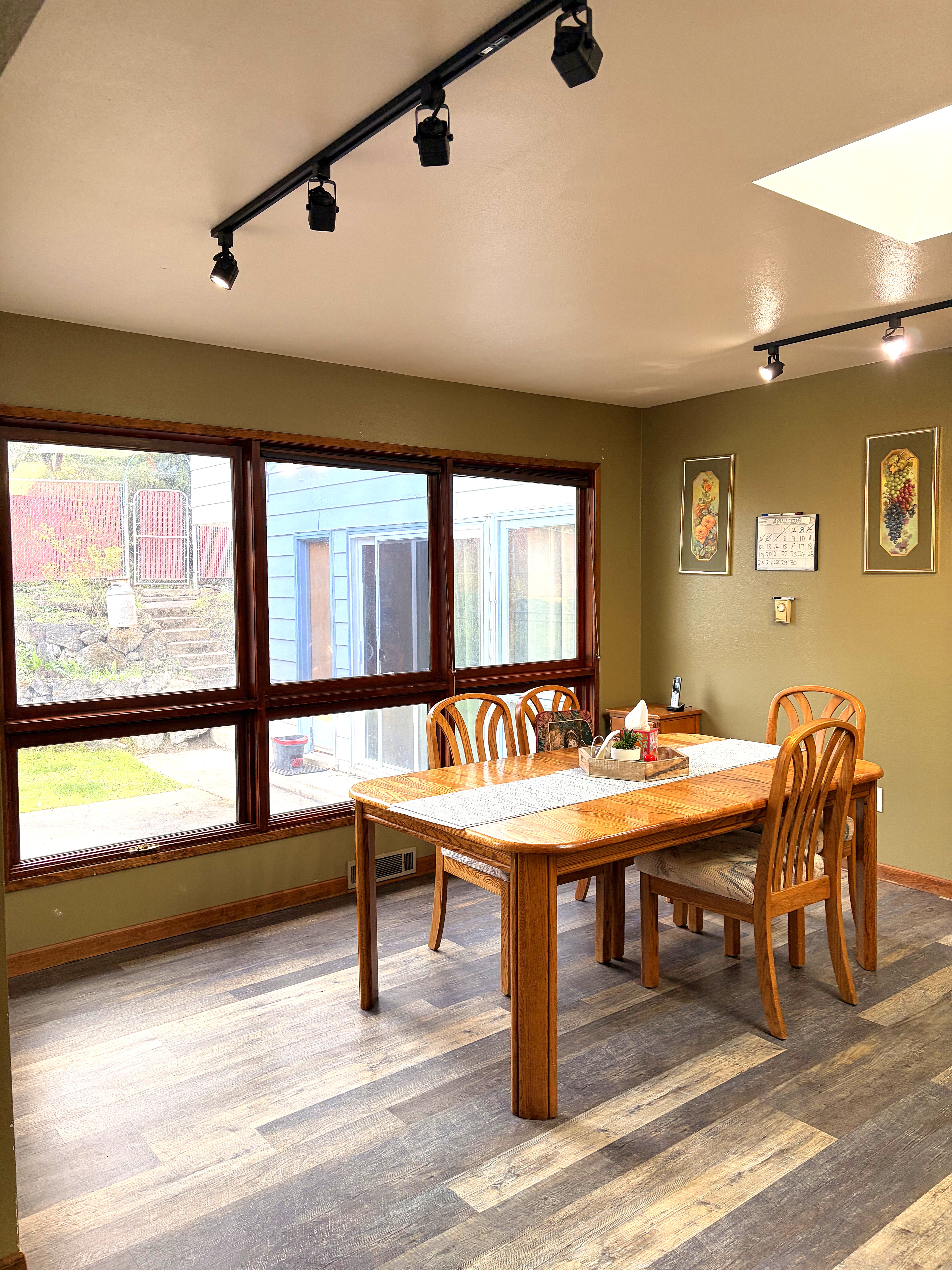 Bright dining room with garden views