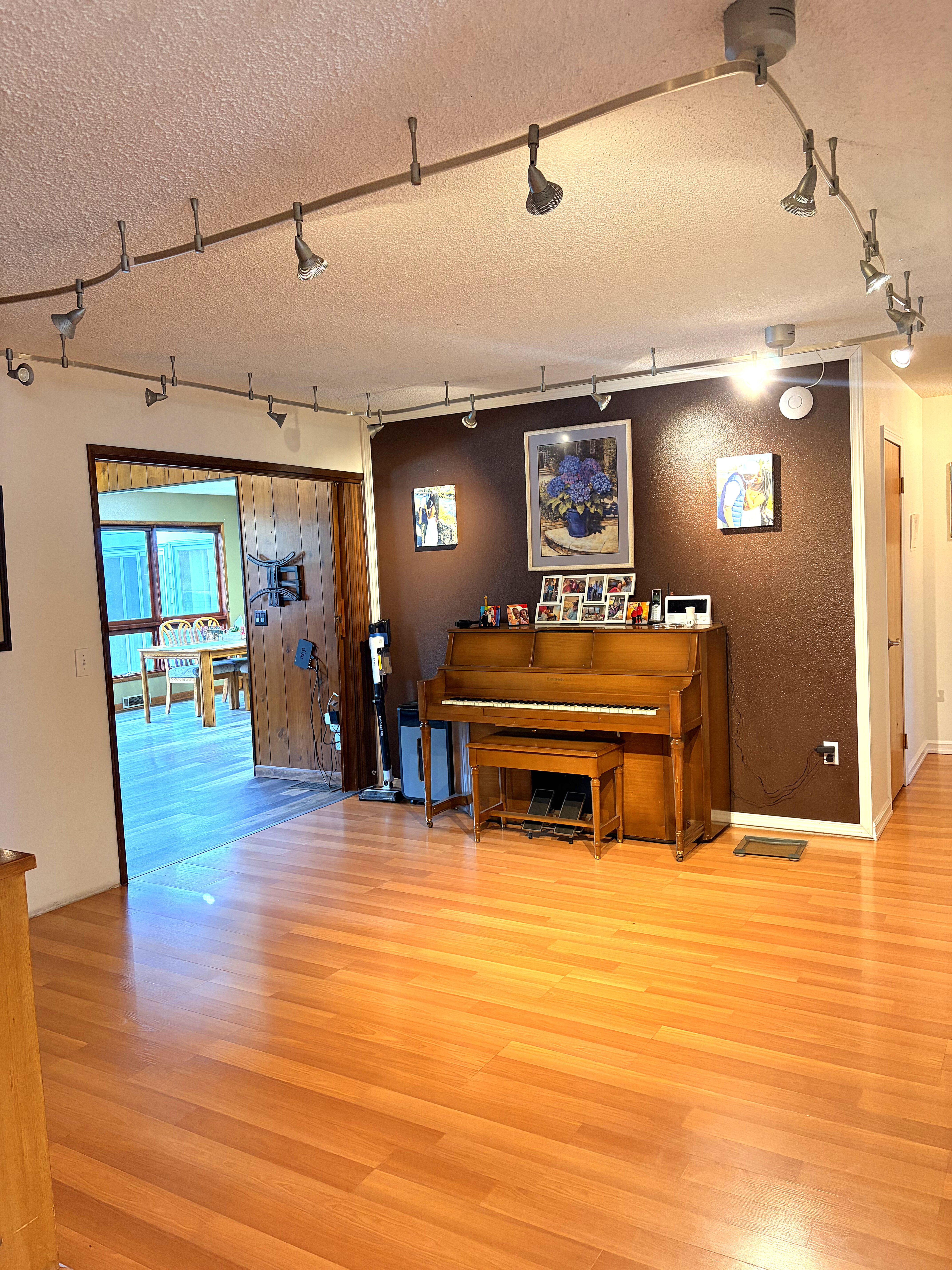 The warm, sunlit living room at ICON Adult Family Home